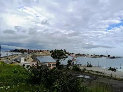 a view of a beach and a body of water at Apartament ,,EDELVAIS- LUX'' in Nesebar