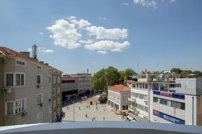 a view of a street in a city with buildings at Hostel Musala in Varna City