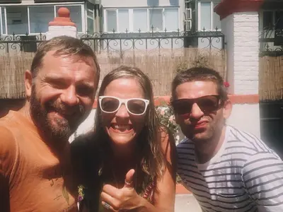 a group of three people posing for a picture at Nomado Hostel in Varna City
