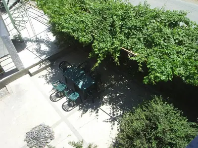 an overhead view of tables and chairs under trees at Дом Христови in Chernomorets