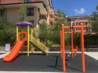 a playground with a slide and a slideintend at Star Dreams, Sveti Vlas in Sveti Vlas