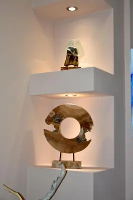 a chair on display in a white shelf at Boutique Villa Amalia in Chernomorets