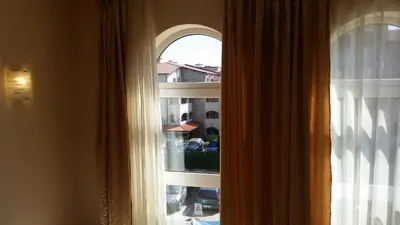 an open window with a view of a city at Aqua Dreams - new wifi in Sveti Vlas