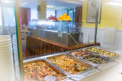 a buffet line with many different types of food at Sozopoli Style Club in Sozopol