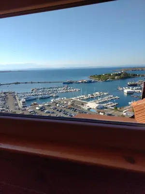 a view of a marina from a window at Guest House Hetodon in Sozopol