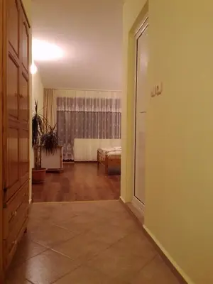 an empty room with a door leading to a living room at Guest House Diamant in Sozopol