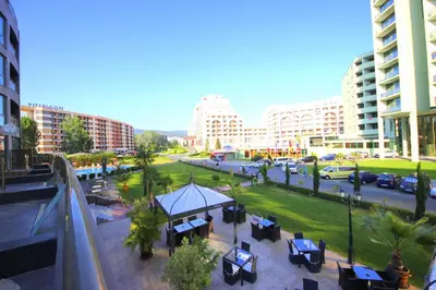 a view of a city with tables and buildings at Menada Sunny Beach Plaza Apartments in Sunny Beach