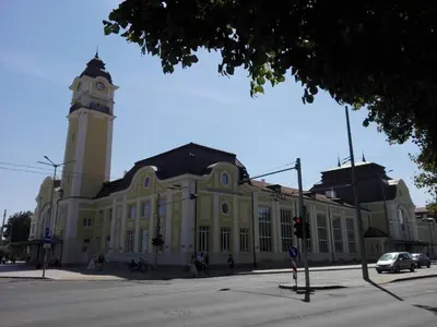 a large building with a clock tower on top of it at INFINITY Blue 1 in Burgas City