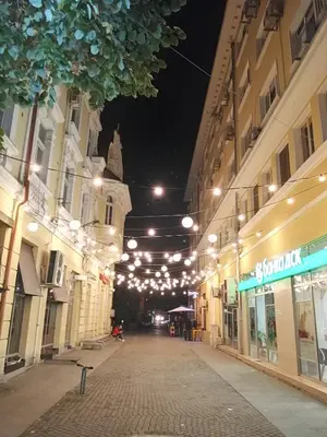 an empty street in a city at night at INFINITY Blue 1 in Burgas City