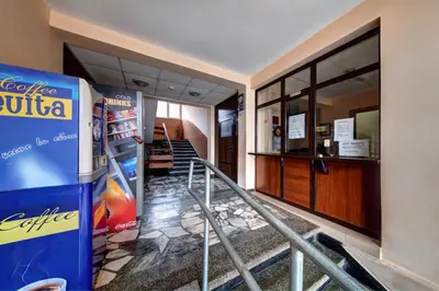 a hallway with a vending machine in a house at Hotel Varly Bryag in Burgas City