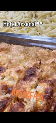 a close up of a dish of food with pasta at Hotel Arsenal in Nesebar