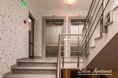 a stairwell in a building with stairs and a stair case at Apartment Cathedral Deluxe in Varna City