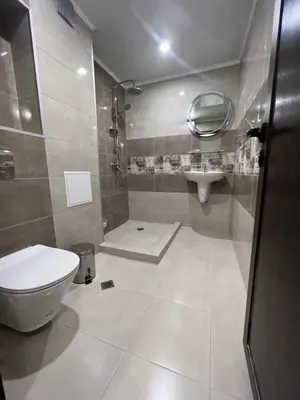 a bathroom with a toilet and a sink at Vista Sul Mare in Burgas City
