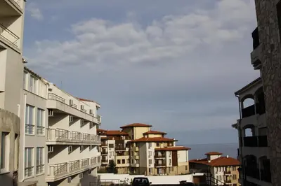 a group of apartment buildings in a city at Galateya Sveti Vlas Bułgaria in Sveti Vlas