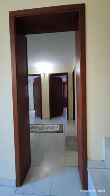 an open doorway into a hallway in a house at апартамент Росен in Nesebar