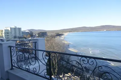 a balcony with a view of the ocean at Ashram Hotel in Primorsko