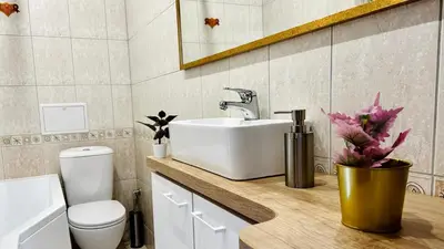 a bathroom with a sink and a toilet at APARTELLO Modern Apartments - CASA REAL in Sveti Vlas in Sveti Vlas