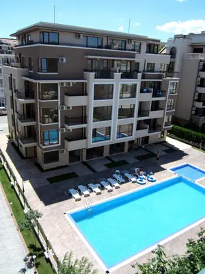 an aerial view of a apartment building with a swimming pool at APARTELLO Modern Apartment - Balkan Breeze 7 in Sunny Beach