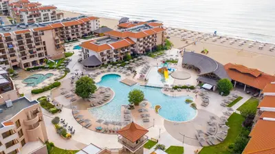 an aerial view of a resort with a swimming pool at HVD Clubhotel Miramar - 24 Hours Ultra All Inclusive & Free Parking in Obzor