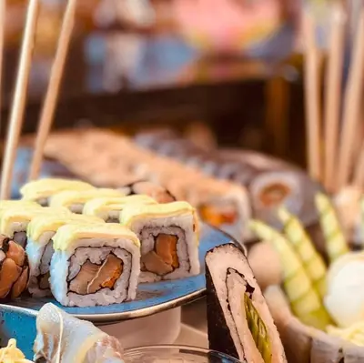 a plate of sushi sitting on top of a table at HVD Clubhotel Miramar - 24 Hours Ultra All Inclusive & Free Parking in Obzor
