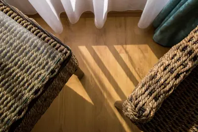 a pair of chairs sitting on top of a wooden floor at Penthouse at White Cliffs in Byala