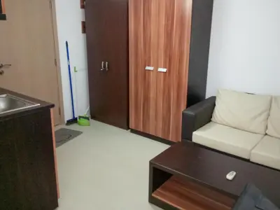 a living room with a couch and a table at Rainbow 3 Apartment-studio 223 in Sunny Beach