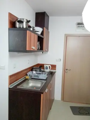 a small kitchen with a sink and a counter top at Rainbow 3 Apartment-studio 223 in Sunny Beach