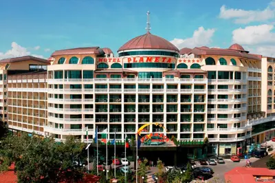 a large white building with a red roof at Planeta Hotel & Aquapark FREE Beach Access - ULTRA All Inclusive in Sunny Beach