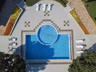 an overhead view of a swimming pool in a building at View Apartments in Sozopol