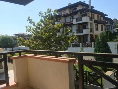 a view of a building from a balcony at Apartment on the sea at St Nikolas Complex-Elena in Chernomorets