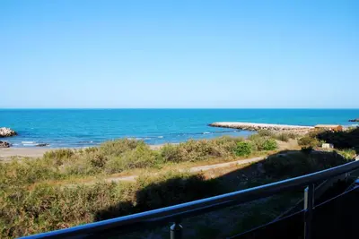 a view of the ocean from a balcony at Dune Boutique Pomorie in Pomorie