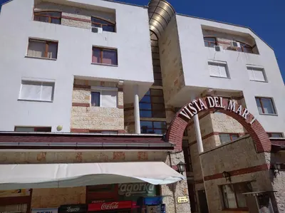 a building with a sign that reads martial delrahim at Vista Del Mar Ap 22 in Ravda