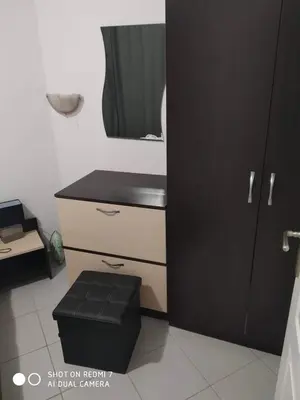 a kitchen with a black counter and a black cabinet at Blue Marine Ap 26 in Ravda