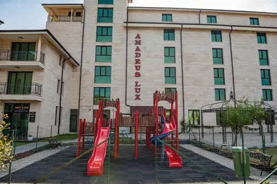 a playground in front of a hotel at Amadeus Lux - Menada Apartments in Sunny Beach