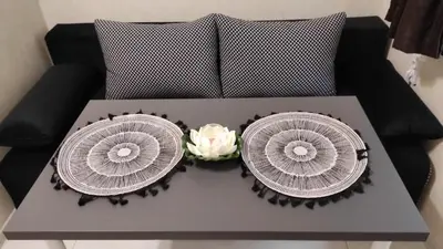 a table with two plates on top of a couch at Burgas Central-Sheynovo in Burgas City