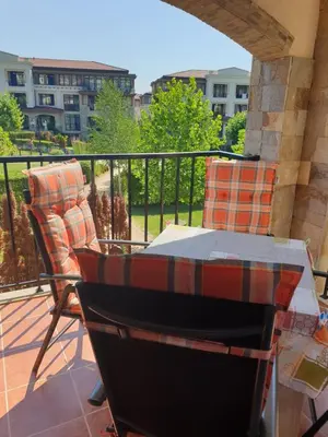 a patio with a table and chairs on a balcony at Alex Studio, Sozopol, Kavaci in Sozopol