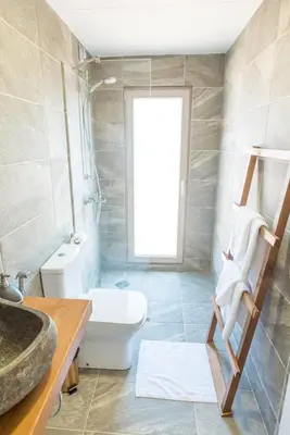 a bathroom with a toilet and a sink at Camping Gradina in Sozopol