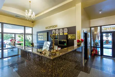 a lobby with a reception desk in a mall at Viand Hotel - All Inclusive in Sunny Beach