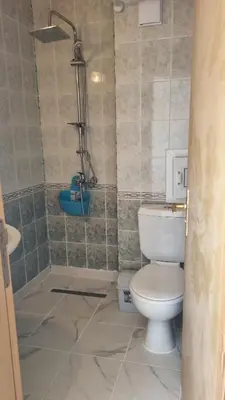 a bathroom with a toilet and a shower at Beautiful Penthouse Apartment in Sunny Beach