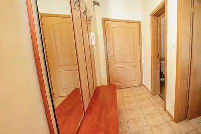 a hallway with a large mirror in a room at Prestige City 1BD Apt with POOL near to Cacao Beach by Flаt Manаger in Sunny Beach