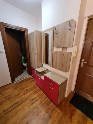 a bathroom with a red vanity and a mirror at MitProt Panorama Bay 2 luks Apartment 173 in Sveti Vlas