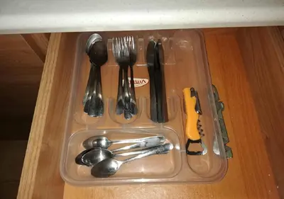a plastic tray with utensils on a table at Charis Cozy Family apart at Sun Village Complex close to the Beach in Sunny Beach