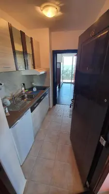 a kitchen with a sink and a counter top at Студия първа линия Черноморец in Chernomorets