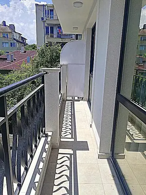a balcony with a cross on the side of a building at Ilarion 5 studio at Top Center in Varna City
