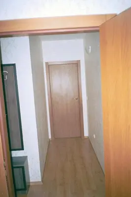 an empty hallway with a door in a room at Apartment Rutland Beach in Ravda