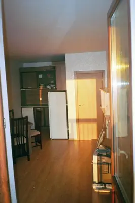 a living room with a kitchen and a dining room at Apartment Rutland Beach in Ravda