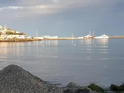 a body of water with boats in a harbor at MitProt luks studio Panorama Bay 2 ap39 in Sveti Vlas