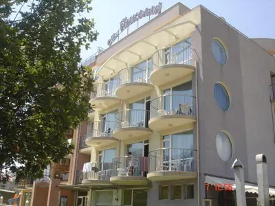 a large building with balconies on the side of it at хотел Свети Николай Приморско in Primorsko