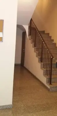 a hallway with a staircase in a house at APARTAMENT PRIMERA in Varna City