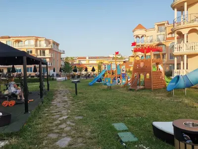 a park with a playground with a slide at Hacienda Beach Apartment mit Meerblick in Sozopol